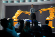 © DC Studio - African American engineer presents new robot-arm technology for factory development, showing heavy-industry resources and infrastructure on a screen during a business conference presentation.