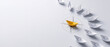 © irasutolive - Yellow paper boat on a compass symbol leading white ships, representing leadership, business strategy, and navigating success in a minimalist style.
