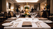 © depparani - Elegant restaurant dining table setup with crystal glassware and cutlery