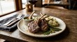 © Raj - Grilled lamb chops served with creamy mashed potatoes roasted asparagus and herb sauce on rustic white plate wooden table.
