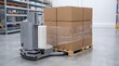 © WisChi - Automated pallet wrapper machine securing stacked cardboard boxes with clear plastic film in a warehouse