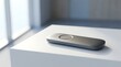© ProPixelshot - A sleek silver feedback device resting on a white table capturing ideas and modern technological concept
