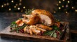 © Nugrah - Traditional roasted Thanksgiving turkey carved on a wooden board with festive herb garnish