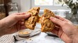 © Тоха Шикула - Warm cookie being torn apart revealing a delicious gooey center
