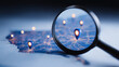© kaliel - A magnifying glass focused on location pins across a map represents geographic search navigation and destination planning.