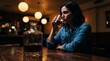 © Boss - Pensive woman drinking whiskey alone in a dark bar at night