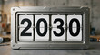 © simohamed - Mechanical flip clock displaying the year 2030, vintage retro style digital time indicator