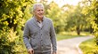 © WellnessCaptures - Senior man enjoying a peaceful walk in a sunlit park.