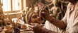 © Suraaj - Artisan painting expressive eyes on a clay Goddess Durga idol in a traditional Kolkata workshop, handcrafted Durga Puja festival preparation banner with copy space