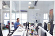 © peopleimages.com - Office, computer and business man with coffee for finance review, investment and research. Coworking, insurance agency and person with tech and drink for financial planning, budget report or proposal