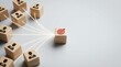 © Chayanan - Customer relation management concept showing a central red dartboard target linked to a network of human icon cubes.