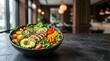 © Food lover - Fresh chicken salad bowl with avocado and chickpeas on a dark stone table in a restaurant