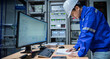 © reewungjunerr - Engineer working at control room,Manager control system,Technician man monitoring program from a lot of monitor