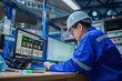 © reewungjunerr - Engineer working at control room,Manager control system,Technician man monitoring program from a lot of monitor
