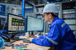 © reewungjunerr - Engineer working at control room,Manager control system,Technician man monitoring program from a lot of monitor