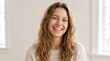© Luiz  Fernando - Beautiful young woman smiling with her teeth visible, genuine happy expression, natural appearance, clean background, soft natural lighting, photorealistic beauty photography