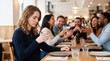 © AlIKY - Young woman sitting apart at restaurant table while group of friends laugh behind her in bright light loneliness and social isolation concept