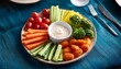 © Derek - platter of fresh vegetables served with dip at a gathering during the afternoon