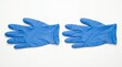 © Bricio - Pair of blue nitrile medical gloves isolated on a white background