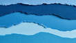 © Fahmida - Blue torn paper layers creating abstract modern paper art landscape.