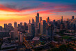 © Ionel - Downtown Chicago skyline under vivid orange sunrise