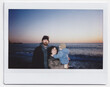 © Lika/Stocksy - Family Portrait By The Sea At Sunset
