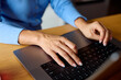 © Ivan Jovanovic/Stocksy - Anonymous person uses laptop keyboard