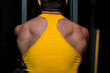 © Jale - fitness trainer doing exercise for back