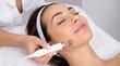 © Reandz - Young Woman Receiving Professional Microcurrent Facial Treatment At Modern Beauty Spa Clinic, Rejuvenating Skin Care Procedure For Anti Aging Benefits