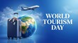 © Naseem - World tourism day concept with a blue suitcase, a globe showing the earth, and a passenger airplane flying in the sky, representing global travel, vacation, and international tourism