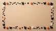 © Papiya - Halloween border frame with black cat figurines, bats, stars, and small pumpkins on a beige background, with empty space, in the center