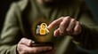 © Bi - Person and magnifying glass icon superimposed on phone screen, focus on selection