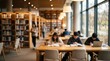 © Abdul - Diverse students studying with books and laptops at wooden tables in a modern university library