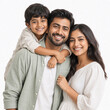 © pranav - Portrait of a happy young Indian family with a smiling child isolated on a white background.