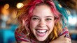 © svastix - A cheerful young girl with vibrant pink and blue hair beams with happiness, showcasing her infectious laughter in a lively atmosphere filled with light and energy.