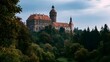 © Bussakon - A grand castle with red roofs and stone towers rises above a dense forest under a cloudy sky