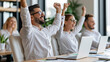 © Nataliya - Diverse corporate team celebrating a successful project milestone around a conference table, joyful gestures, laptops and documents visible, modern workplace culture, teamwork,
