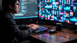 ©  DreamBuild Studio - Software developer working on computer code and data analytics in a dark office