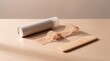 © Ingvar Shelly - Minimalist Haircare Flat Lay with Lace Melting Spray and Wooden Comb for Beauty Website Banner