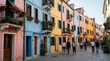 © Oleksandr - Tourists walk along narrow street lined with colorful buildings in Europe. Brightly painted residential houses feature flower balconies, shutters. People explore historic urban neighborhood on sunny