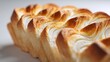 © Kholid - Close-up of freshly baked wavy milk bread on white background