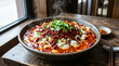© BIMO - Authentic Sichuan style spicy boiled fish served in a large ceramic bowl.