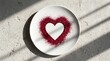 © lolipop - Red heart shape made of sparkling glitter on white ceramic plate with valentines day sparkling love symbol romantic celebration decorative background affection creative