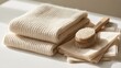 © InfiniteStudio - Premium cashmere sweater care concept with folded cream knitwear and garment brush on a bright surface Generative AI