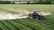 © Generative AI - Red tractor spraying crops in green field