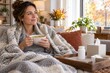 © Olena Apetroaiei - Adult recovering at home with warm soup and medicine nearby, illustrating nourishment, self-care and cold-season recovery.