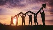 © Wajid - Team silhouette and up graph arrow on sunset background, leadership and teamwork concept