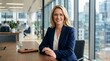 © RONI - Confident Businesswoman Smiling in Modern Office