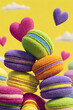 © Olena Liulko - Colorful macaron stack with floating hearts in bright background
