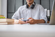 © Charlie's - Student Using Smartphone for Online Education and Internet Research with Artificial Intelligence AI Tools for Learning Research Technology for Everyday Learning.